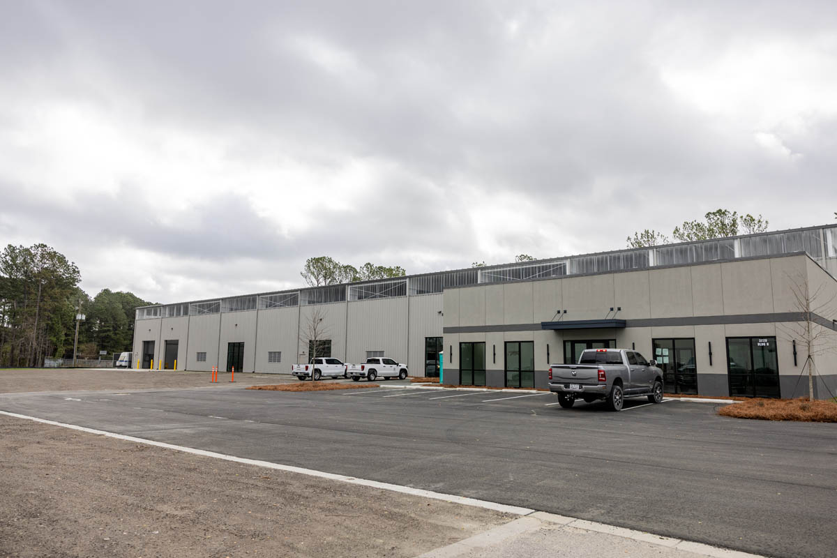 tan commercial development in open parking lot